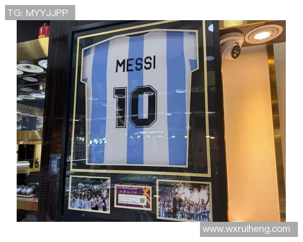 安哥拉队长赛后自豪展示与梅西交换的签名球衣将永久珍藏 安哥拉队长赛后自豪展示与梅西交换的签名球衣将永久珍藏